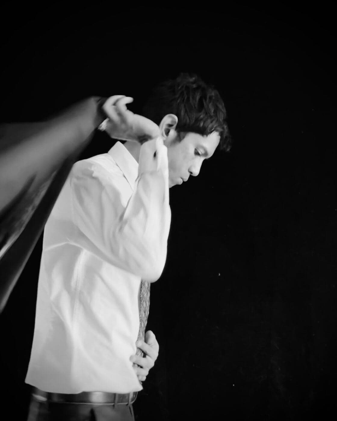 Raul Lee Bhaskaran putting on a robe